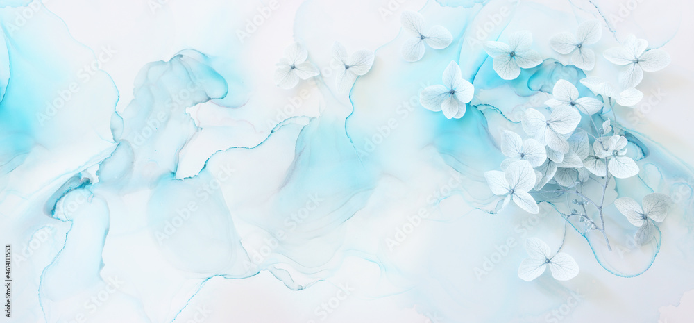 Creative image of pastel blue Hydrangea flowers on artistic ink background. Top view with copy space Creative image of pastel blue Hydrangea flowers on artistic ink background. Top view with copy space