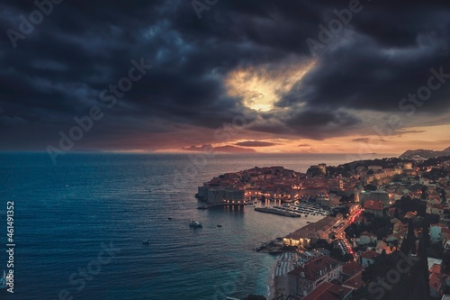 Fototapeta Naklejka Na Ścianę i Meble -  Travel to Croatia. Aerial night image of summer sky. Popular tourist destination in Hrvatska, Dubrovnik has hundreds of tourists to take pictures of the medieval fortification that has become iconic