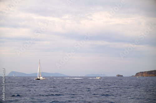 Catamaran sail Yacht anchored on deep blue sea water
