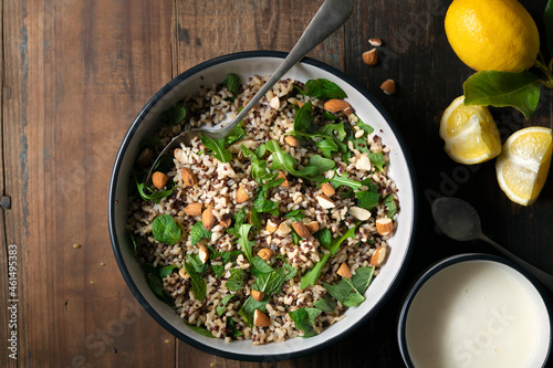 Quinoa and brown rice tabouli with fresh mint and lemon and yogurt dressing. photo