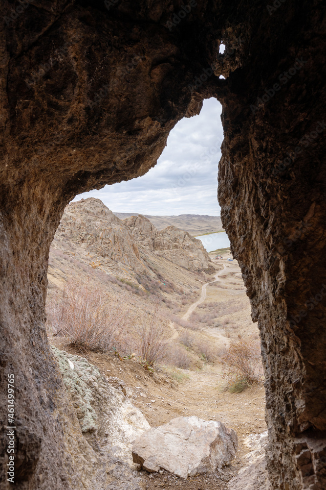 View of Tamgaly Tas tract from a small cave in the rock. Tamgaly became a UNESCO World Heritage Site in 2004. Republic of Kazakhstan, Almaty Region.