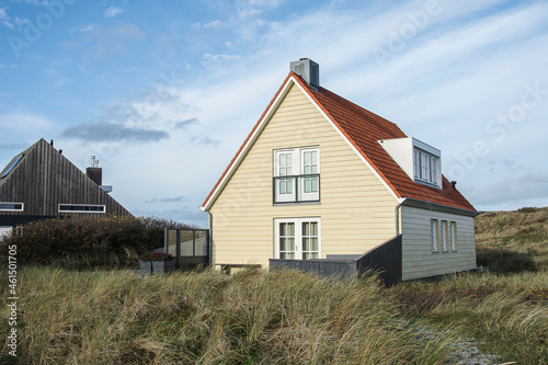 Vacation home in the dunes of the Wadden island Vlieland on a sunny day  in autumn