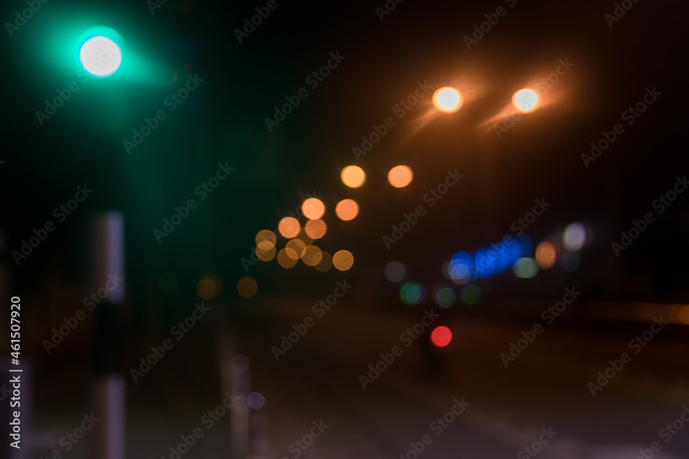 Night street bokeh light. View of the street with the blur style making bokeh scene