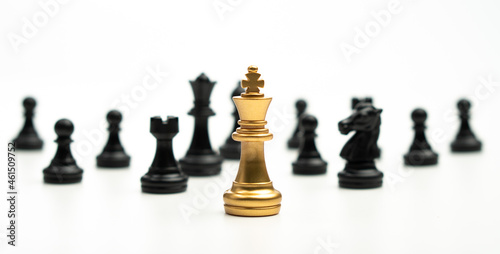 Golden Chess King standing to Be around of other chess, Concept of a leader must have courage and challenge in the competition, leadership and business vision for a win in business games