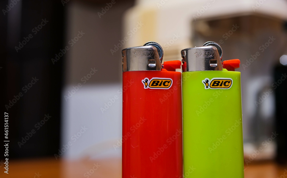 Miercurea Ciuc, Romania- 07 October 2021: Red and green Bic cigarette  lighters , space for text. Stock Photo | Adobe Stock