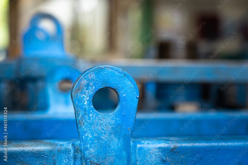 Metal plate pad-eye lifting point of heavy equipment which is use to hook up with shackle for safety lift operation. Industrial object photo. Close-up and selective focus. - obrazy, fototapety, plakaty 