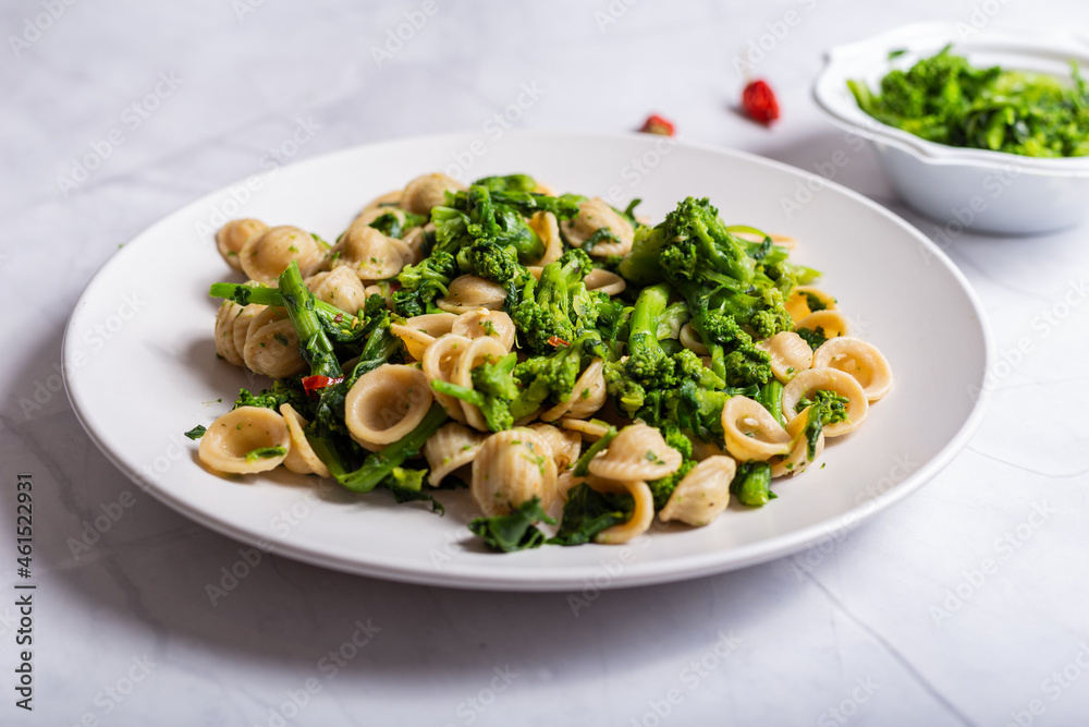 Orecchiette with turnip tops, a typical dish of Italian cuisine Orecchiette with turnip tops, a typical dish of Italian cuisine