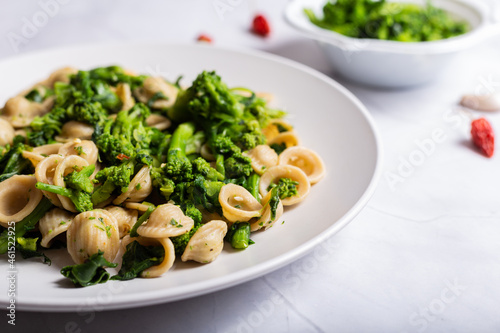 Orecchiette with turnip tops, a typical dish of Italian cuisine photo
