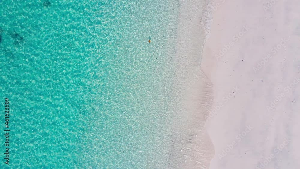 Aerial view of drone. Scene of top view beach and seawater on sandy beach in summer. Nature and travel concept. Aerial view of drone. Scene of top view beach and seawater on sandy beach in summer. Nature and travel concept.