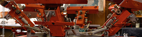 silk screen textile printery banner. print screening apparatus. serigraph printing production