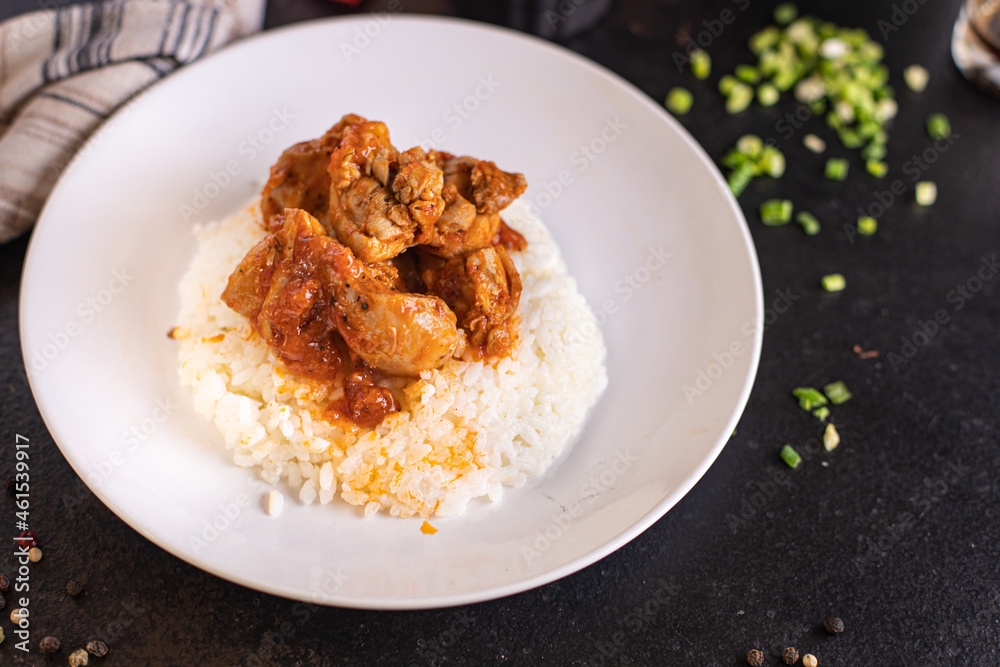 rice curry meat vegetable chicken spice tomato sauce meal snack on the table copy space food background rustic keto or paleo diet rice curry meat vegetable chicken spice tomato sauce meal snack on the table copy space food background rustic keto or paleo diet