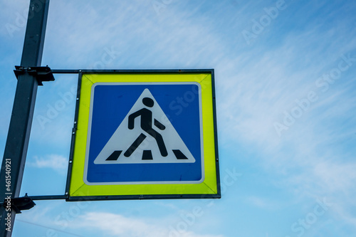 Pedestrian crossing signon blu sky