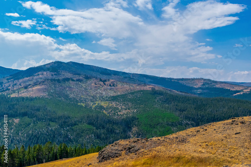 Clear sky with forest fire smoke in the hills of Yellowstone. 