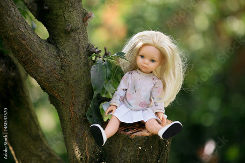 doll in the garden in autumn spring summer
