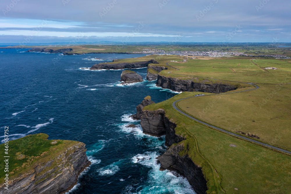 Beautiful green grass and cliffs in Ireland Beautiful green grass and cliffs in Ireland