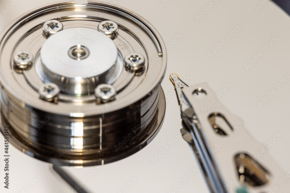The disassembled HDD spindel with reading/writing head. The disassembled HDD spindel with reading/writing head.