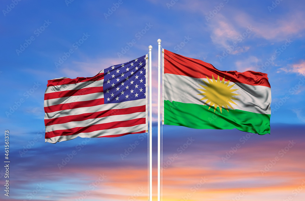 usa and Kurdistan two flags on flagpoles and blue cloudy sky