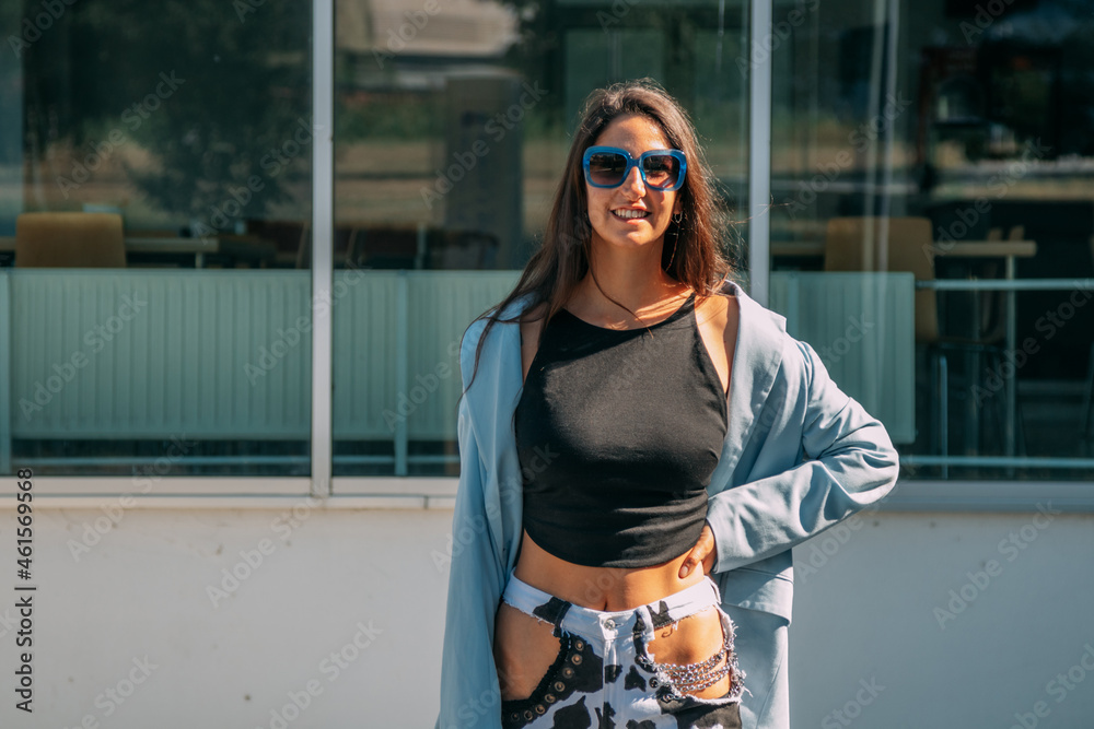 girl in fashionable sunglasses on the street girl in fashionable sunglasses on the street