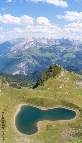 Panoramic view of the Lac du Montagnon  the famous heart-shaped lake in the Pyrenees. top view shot