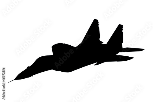 Silhouette of a fighter jet in flight