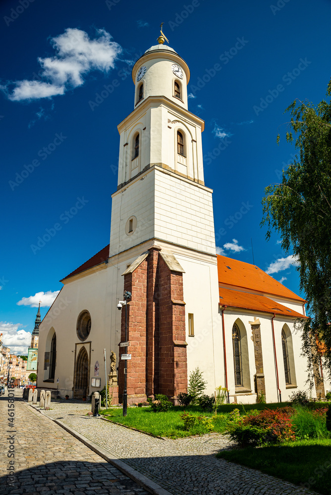 Bolkow, Poland - August 08, 2021. Catholic church of Saint Jadwiga in Main square with statue of Pope John Paul II 