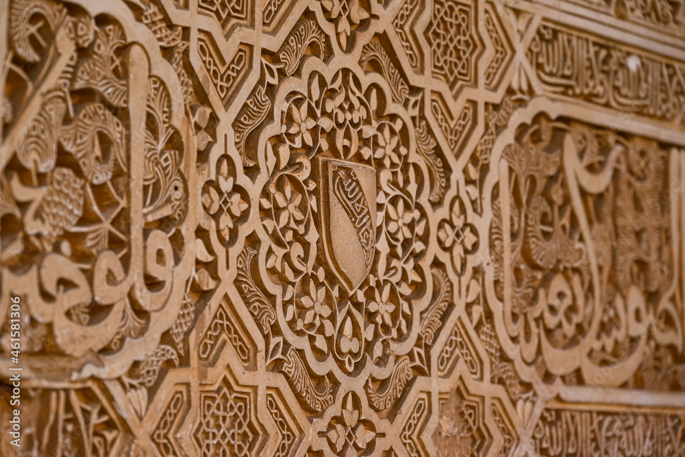 Close up of moorish ornaments at the Court of the Myrtles (Patio de los Arrayanes), part of the Nasrid palaces, Alhambra de Granada UNESCO World Heritage Site, Granada, Andalusia, Spain