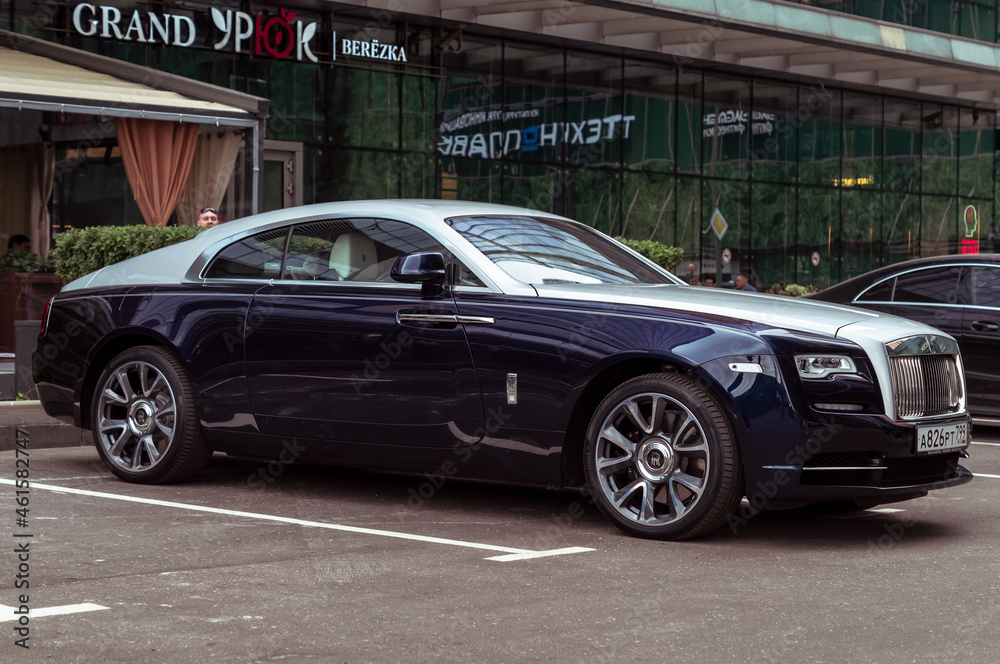 Rolls-Royce Wraith parked in parking space near Moscow City Business  Center. Front side view of luxury 2 door coupe car. Rolls-Royce is a luxury  automobile maker. Stock-foto | Adobe Stock