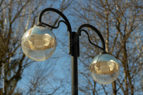 Street lighting during the day. Lighting in the park.