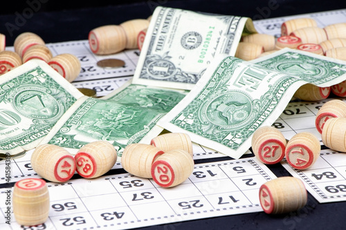 Board game lotto with wooden barrels. Lotto cards. Bingo games. Gambling.