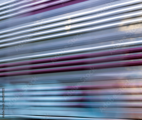 Photo taking in front of train, long exposure. Abstract blurred long exposure photo of a moving train.