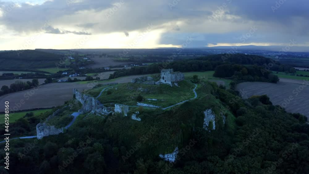 Rock of Dunamase, County Laois, Ireland, September 2021. Drone slowly orbits the ruined castle whie gradually ascending from the northern to southern face. Rock of Dunamase, County Laois, Ireland, September 2021. Drone slowly orbits the ruined castle whie gradually ascending from the northern to southern face.