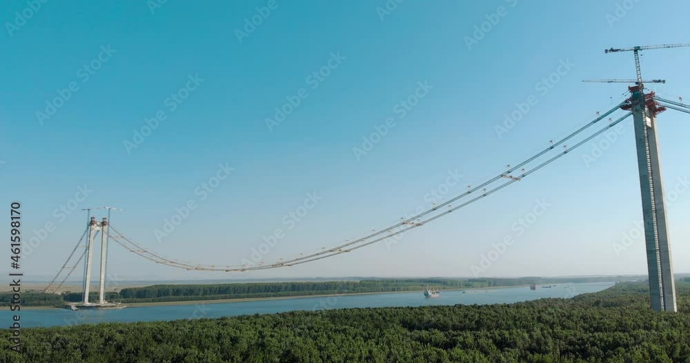 View Of Romania's Braila Bridge Under Construction Viaduct Over Danube River. Static Shot