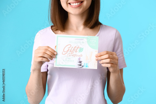 Happy young woman with gift...