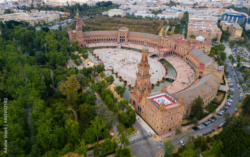 Aerial view of Plaza d'Espana with park and a bridge on ver the canal in Sevilla