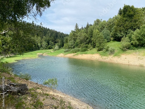 Artificial reservoir Lake Lokve or Artificial accumulation Lokvarsko Lake - Gorski kotar, Croatia (Lokvarsko jezero ili umjetno akumulacijsko Omladinsko jezero, Lokve - Gorski kotar, Hrvatska) photo