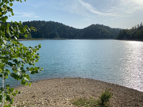 Artificial reservoir Lake Lokve or Artificial accumulation Lokvarsko Lake - Gorski kotar, Croatia (Lokvarsko jezero ili umjetno akumulacijsko Omladinsko jezero, Lokve - Gorski kotar, Hrvatska) photo