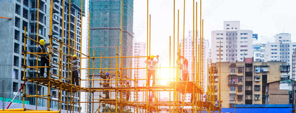 Photography Construction workers working on scaffolding