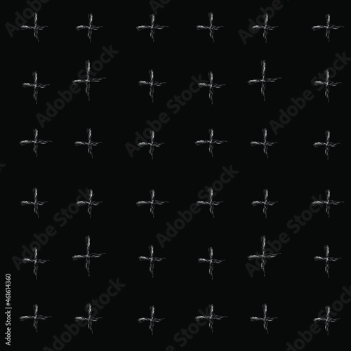White chalk crosses on a black background