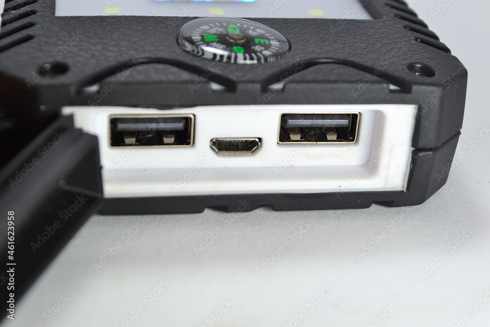Two USB Port and Micro USB with Black Rubber cover in white and Blurry background Two USB Port and Micro USB with Black Rubber cover in white and Blurry background