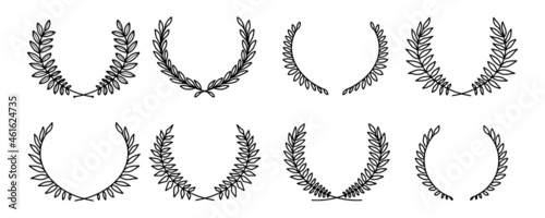 Laurel wreath. Set of outline and vector hand drawn laurel wreaths isolated on white background. Doodle style. Outline floral frames.