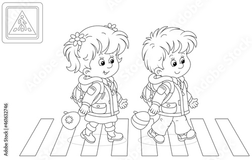 Cheerful little schoolboy and schoolgirl with backpacks going to their school and crossing a road on a zebra crossing, black and white vector cartoon illustration for a coloring book page