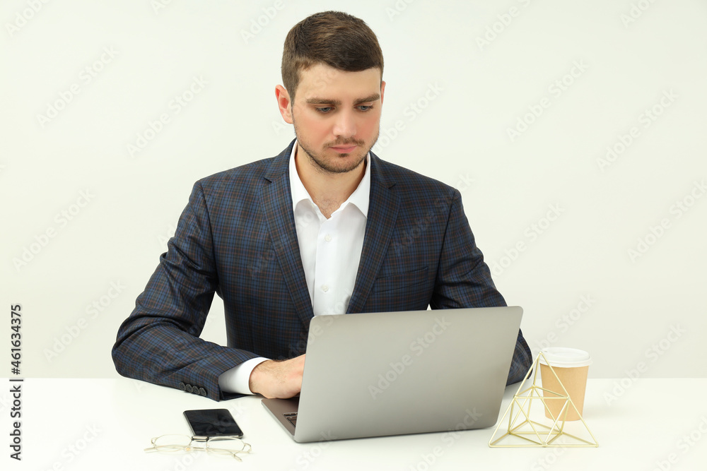 Business concept with young man working on laptop Business concept with young man working on laptop