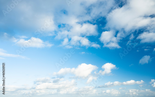 Stunning view of a blue sky with some fluffy clouds during a sunny day. Natural background  sky replacement  copy space..