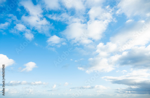 Stunning view of a blue sky with some fluffy clouds during a sunny day. Natural background, sky replacement, copy space..