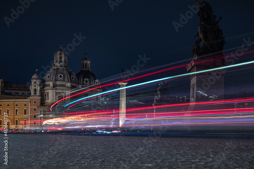 Photography traffic in the night. Piazza Venezia Rome Italy.