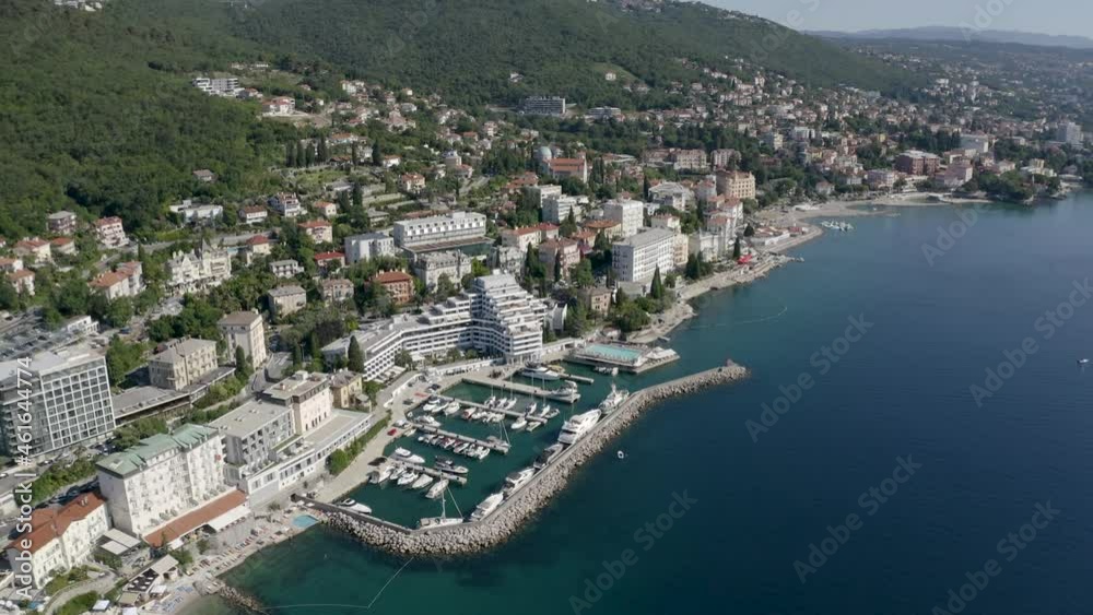 Seafront Luxury Hotel Admiral With Marina At Daytime In Opatija, Croatia. - aerial Seafront Luxury Hotel Admiral With Marina At Daytime In Opatija, Croatia. - aerial