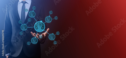 Businessman holding on hand icon of user man woman low poly polygon style. Internet icons interface foreground. global network media concept.