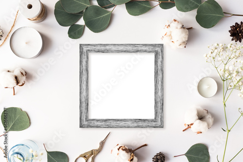 Stylish branding mockup to display your artworks. Cute vintage mock up on wooden background. Flat lay top view.