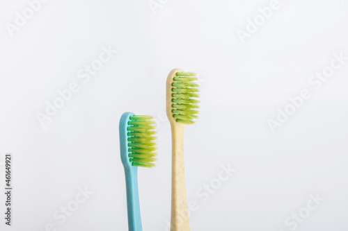 Two toothbrushes  close up  isolated on white.
