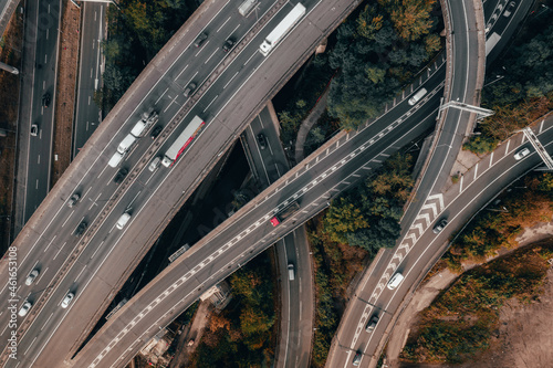 Vehicles in the UK Driving on a Spaghetti Junction Interchange At Sunset